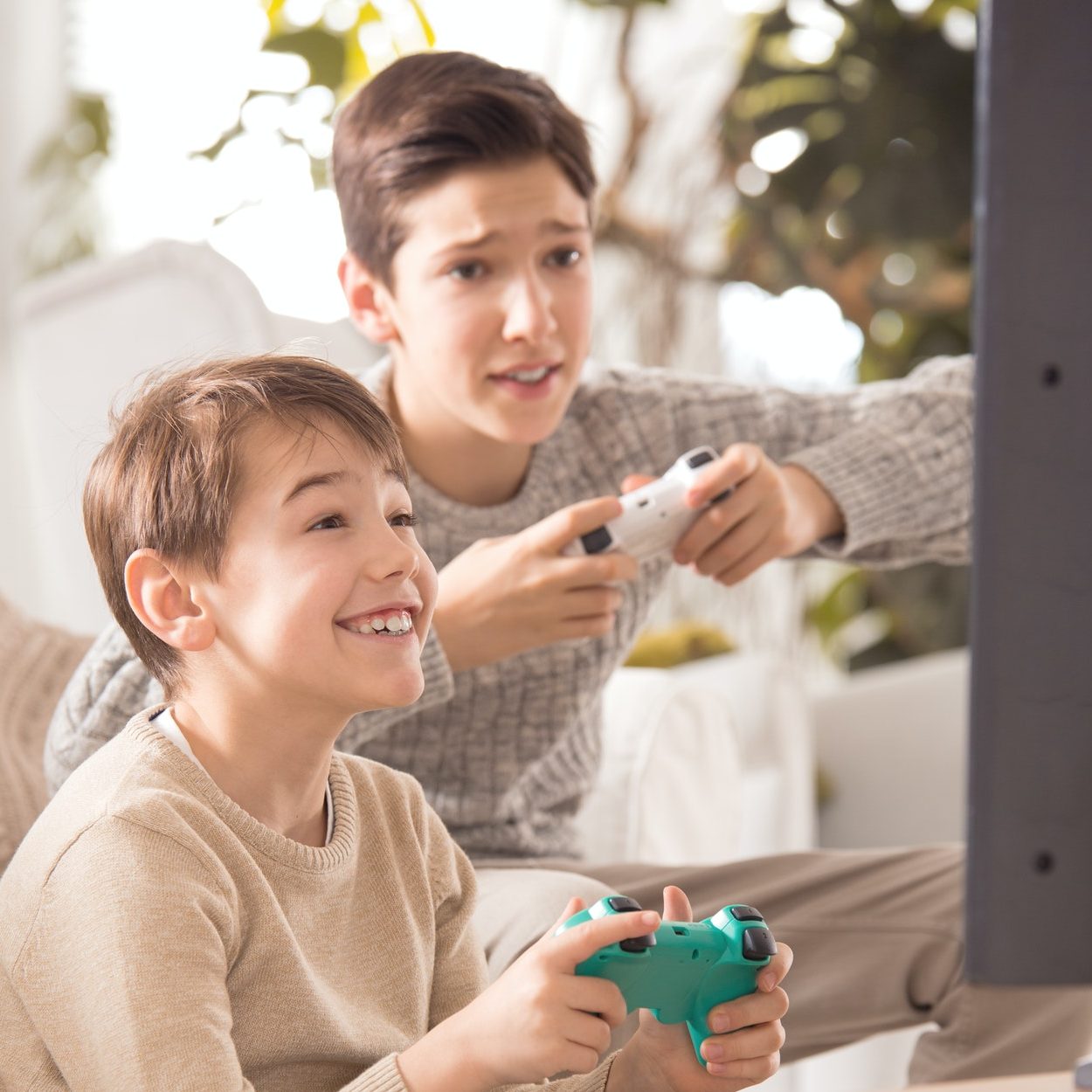 brothers-playing-on-playstation-e1615963163461.jpg